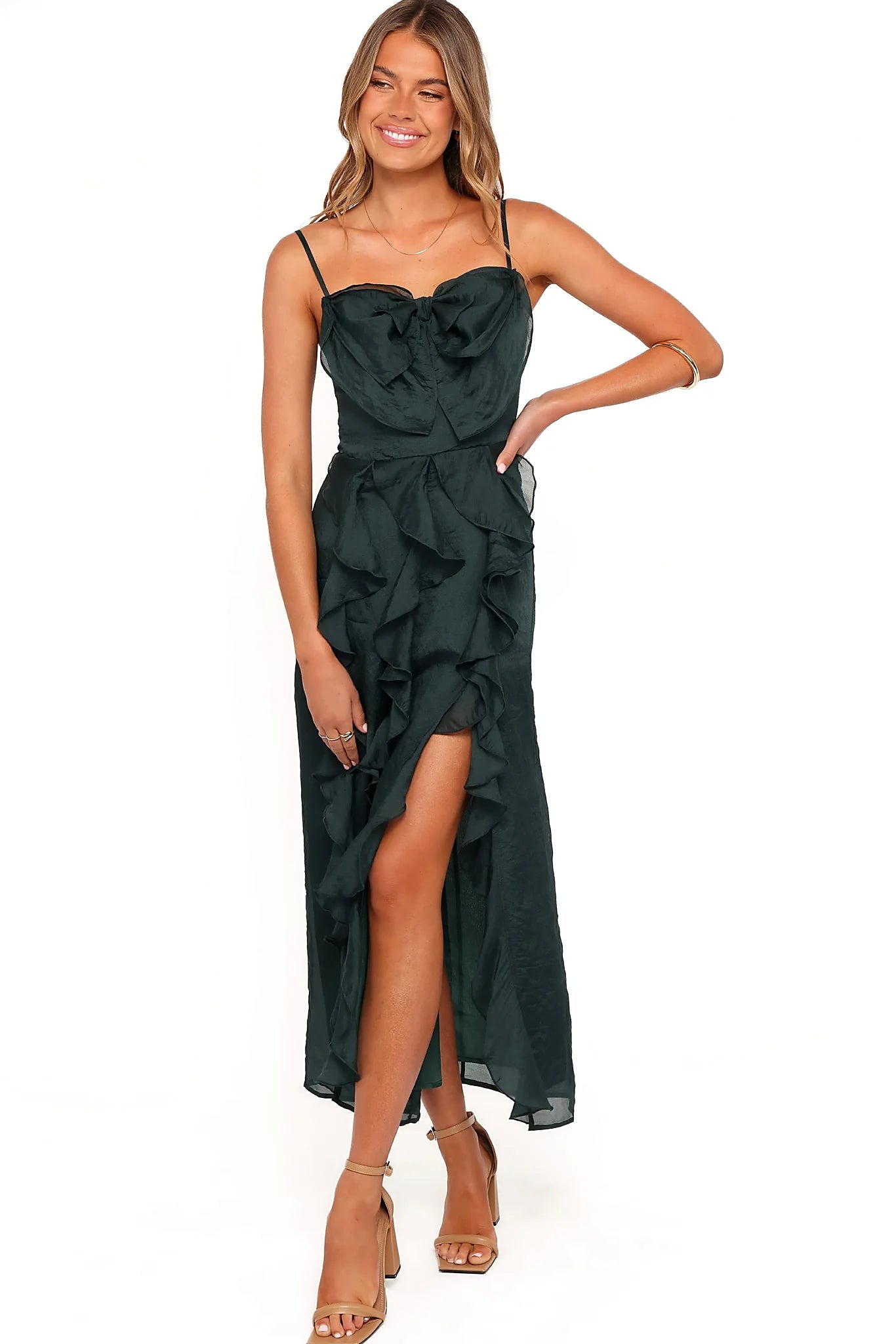 Front split and thin adjustable straps on an emerald midi dress
