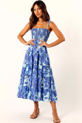 Blue floral midi dress with square neckline and tie close straps