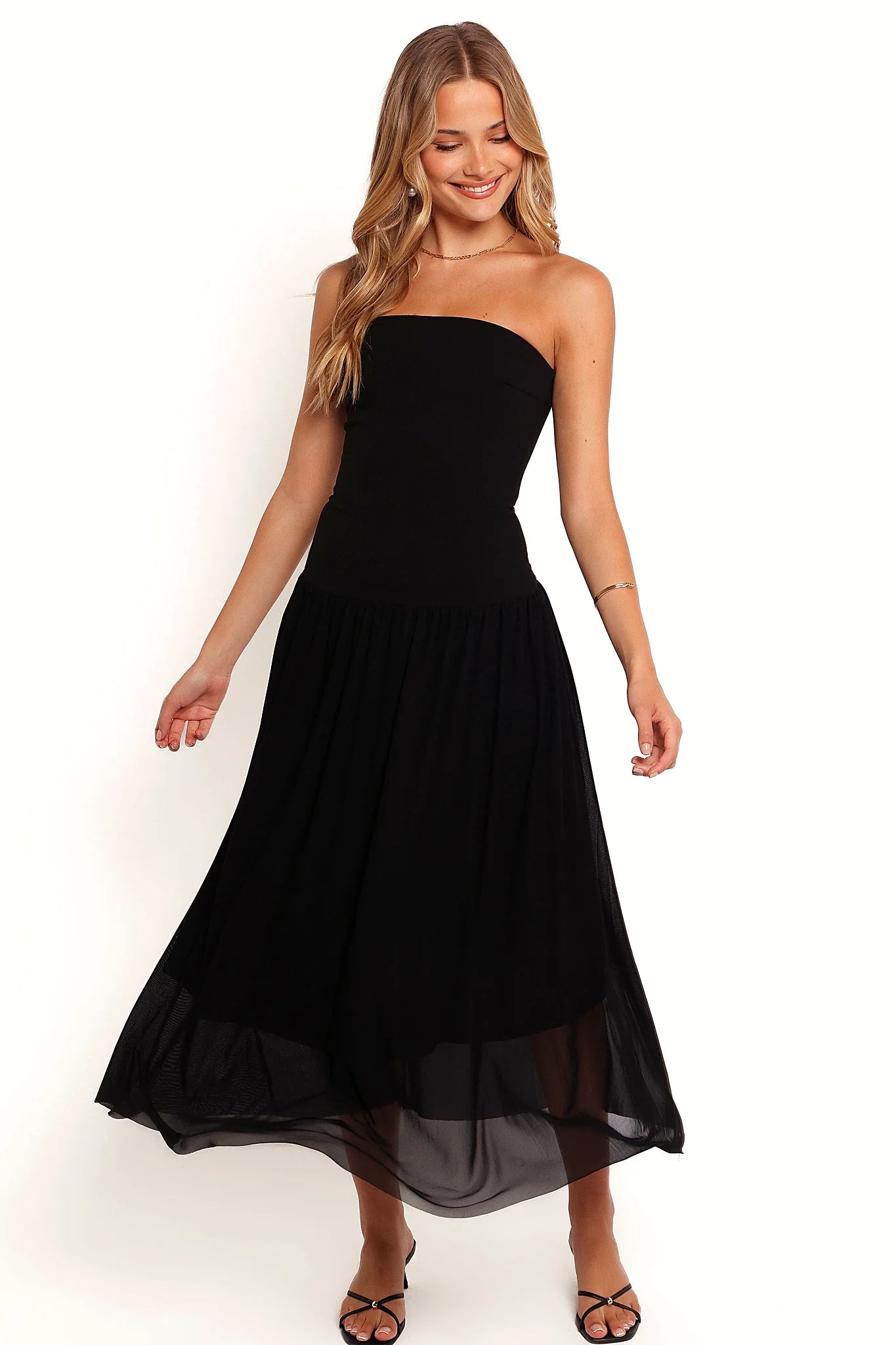 Mesh overlay a-line skirt on a black drop waist midi dress