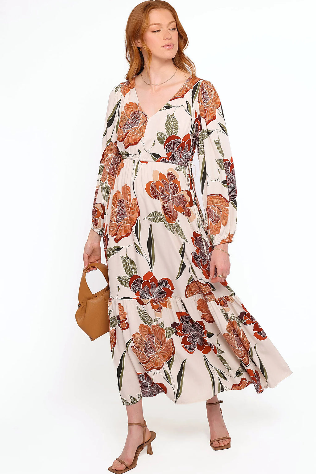 Drawstring tie waistline and pockets on a floral midi dress