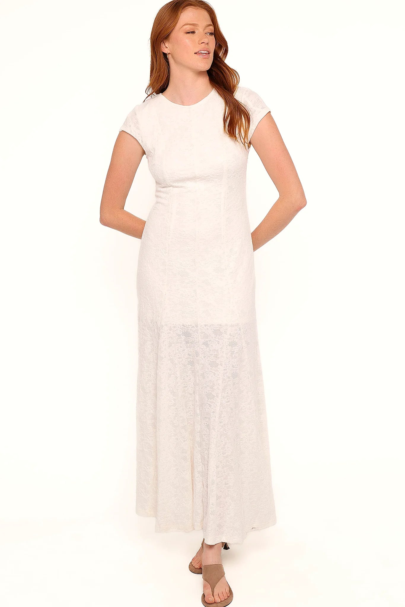 Short sleeves on a white lace maxi gown