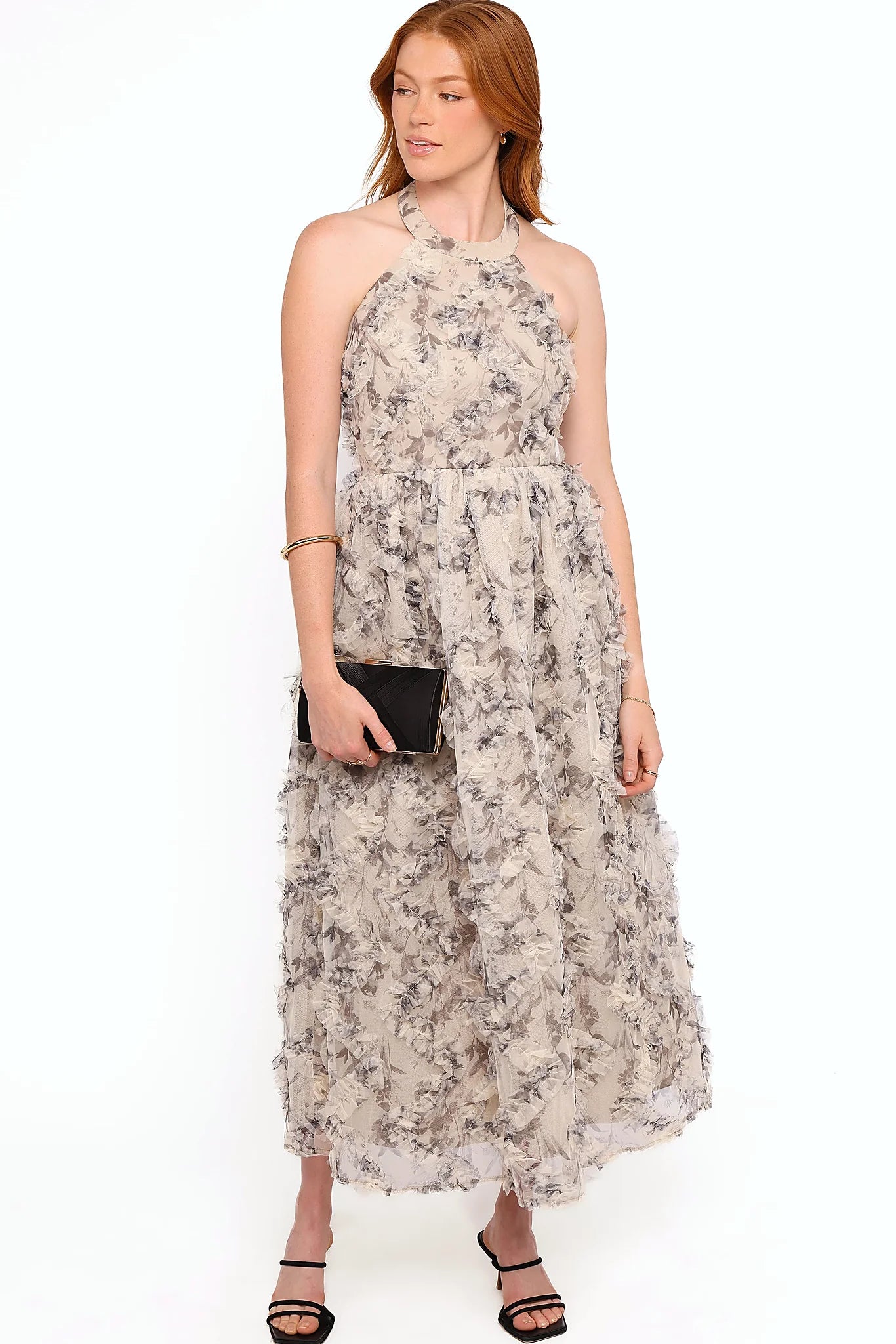 Tulle overlay with ruffle detail on a floral a-line midi dress