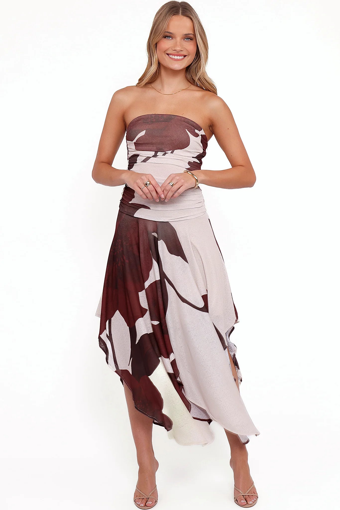 Handkerchief hemline on a brown floral midi dress