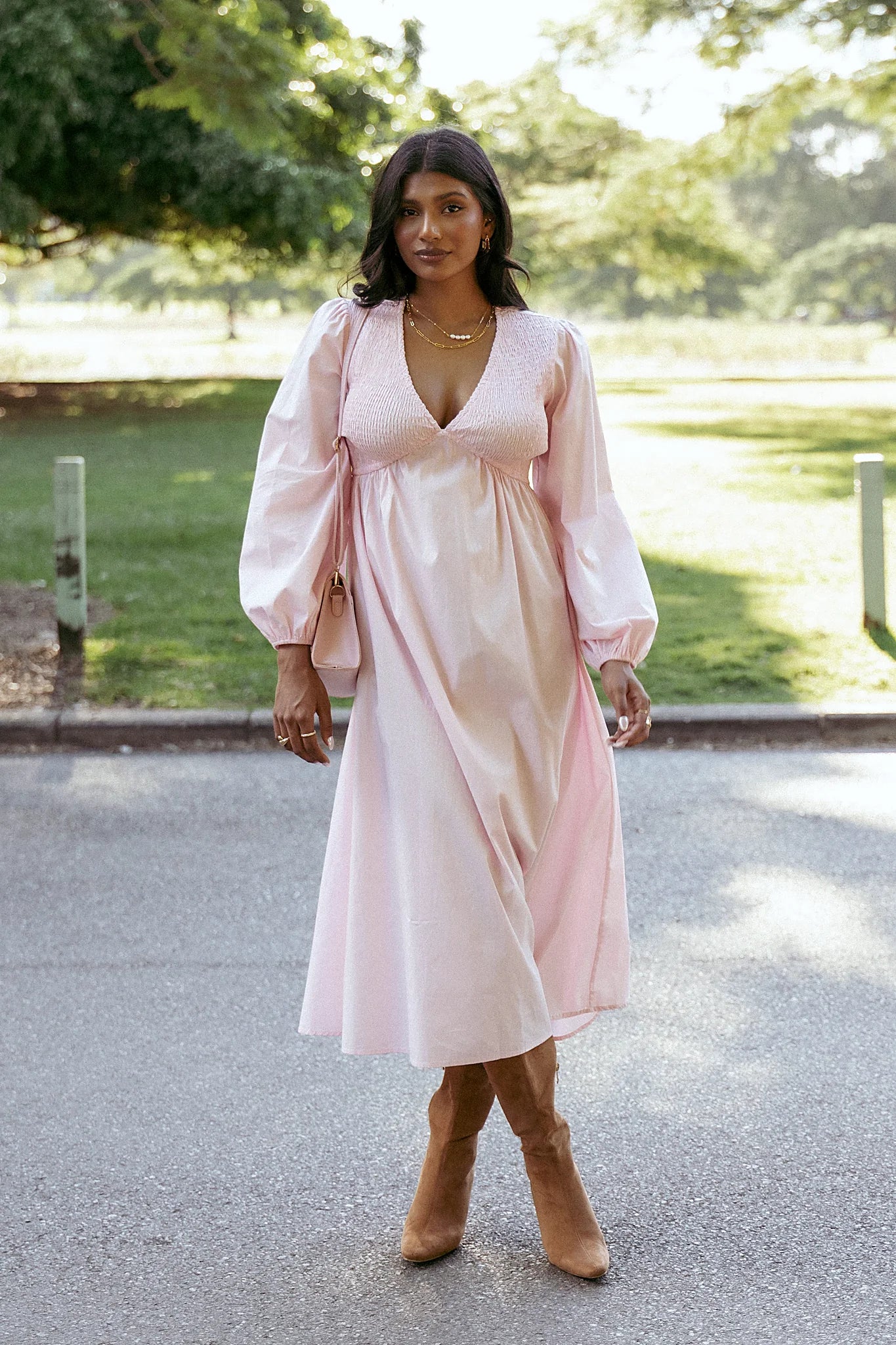Elasticised cuffs on a pink cotton maxi dress