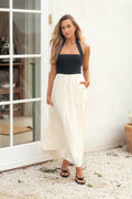 Black and cream maxi dress with square neckline and halterneck
