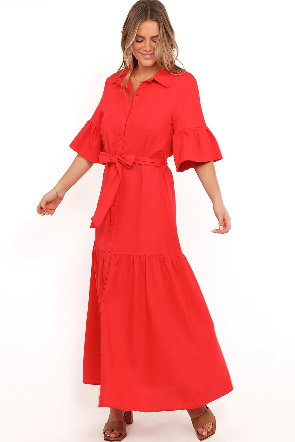 Belt loops with removable waist tie on a red midi dress