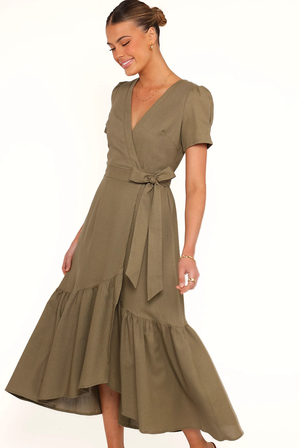 Short sleeves and shirred waistband on an olive midi dress