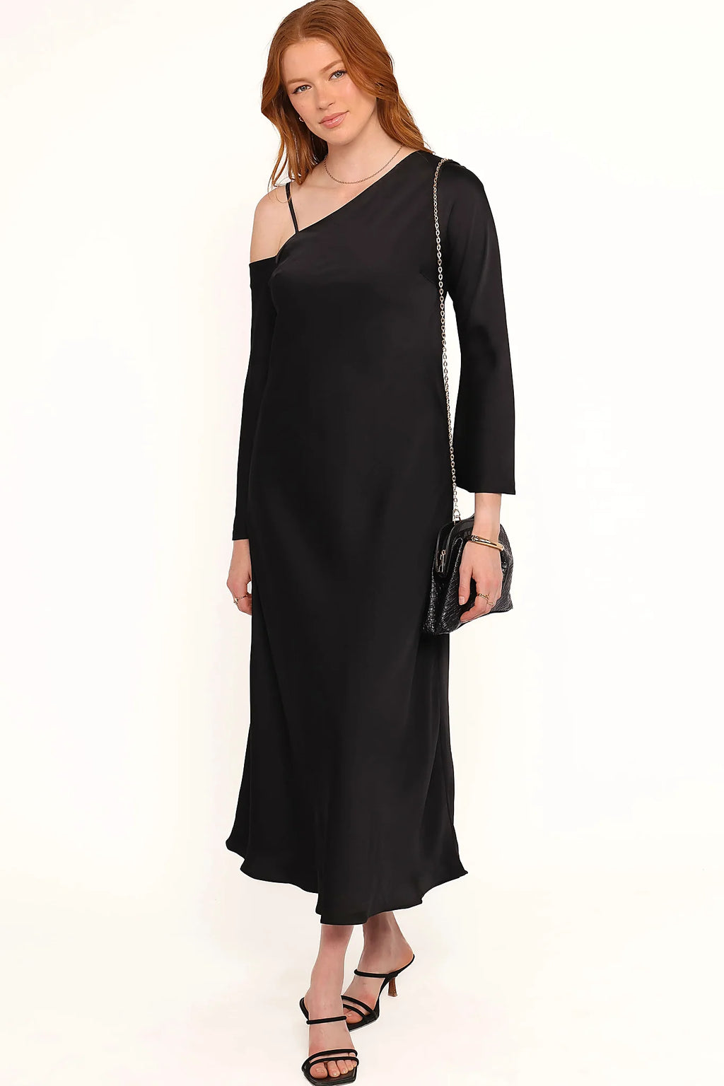 Single thin adjustable strap on a black satin maxi dress