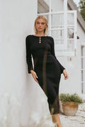 Black ribbed knit maxi dress with long sleeves and bust cut out