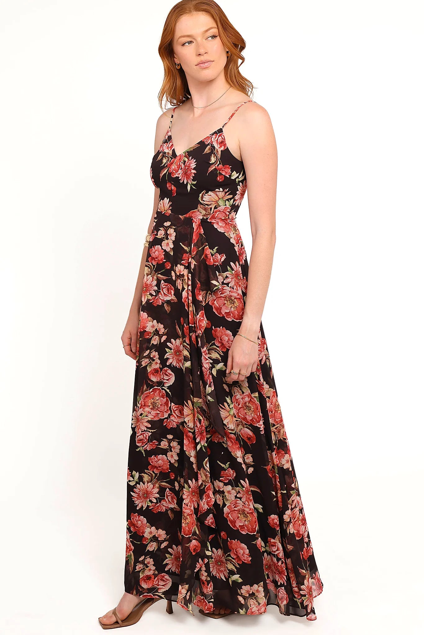 Ruffle detail and thin adjustable straps on a black floral maxi dress