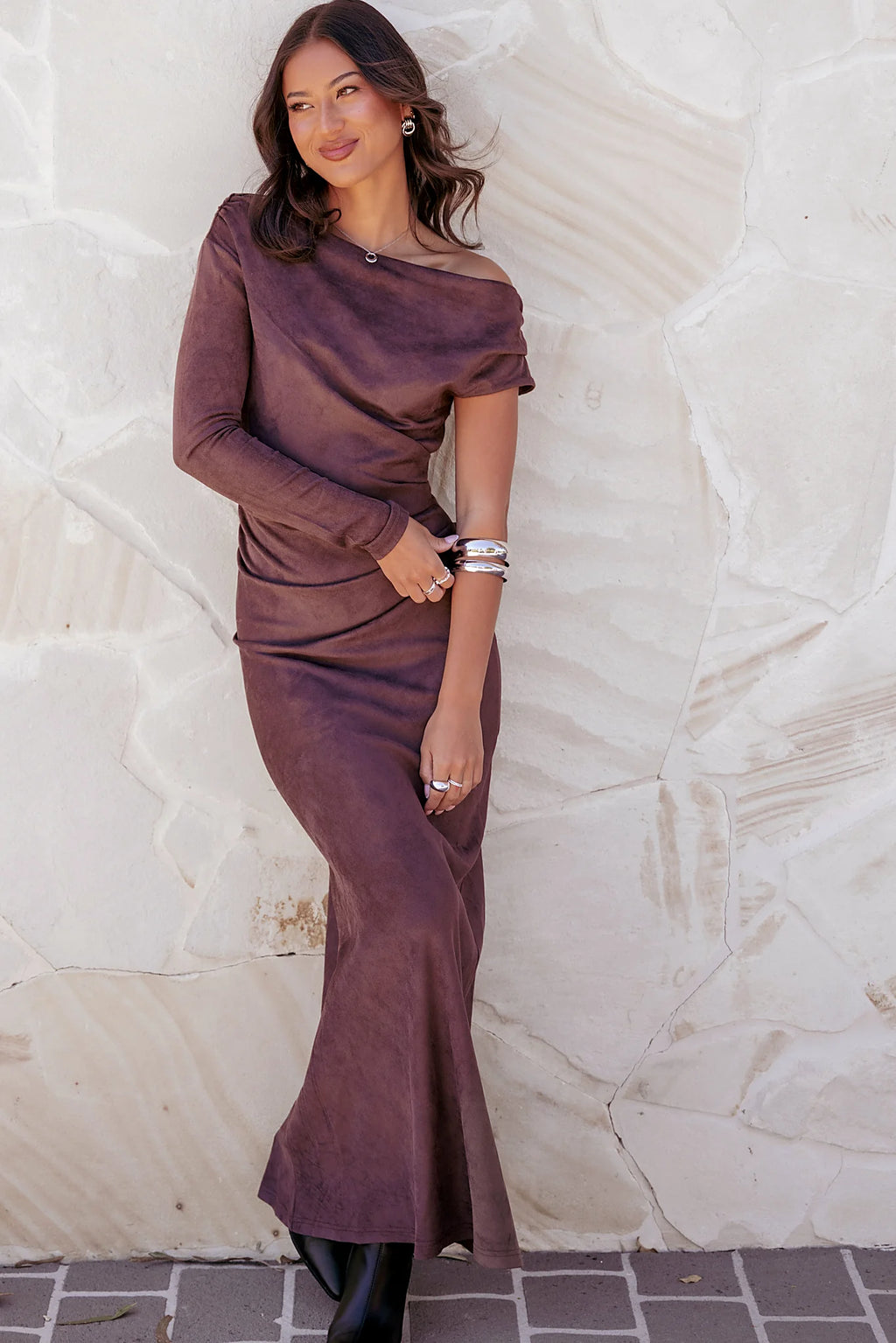 Single long sleeve and gathered detail on a brown bodycon maxi dress