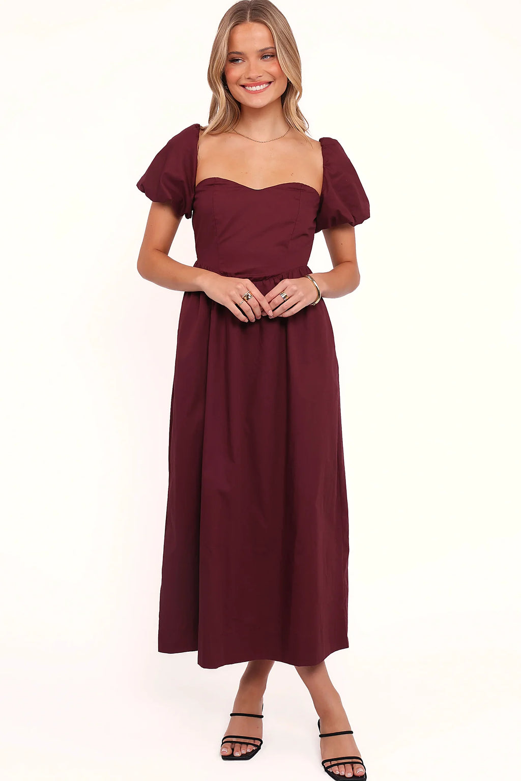 A-line skirt with functional pockets on a cherry midi dress