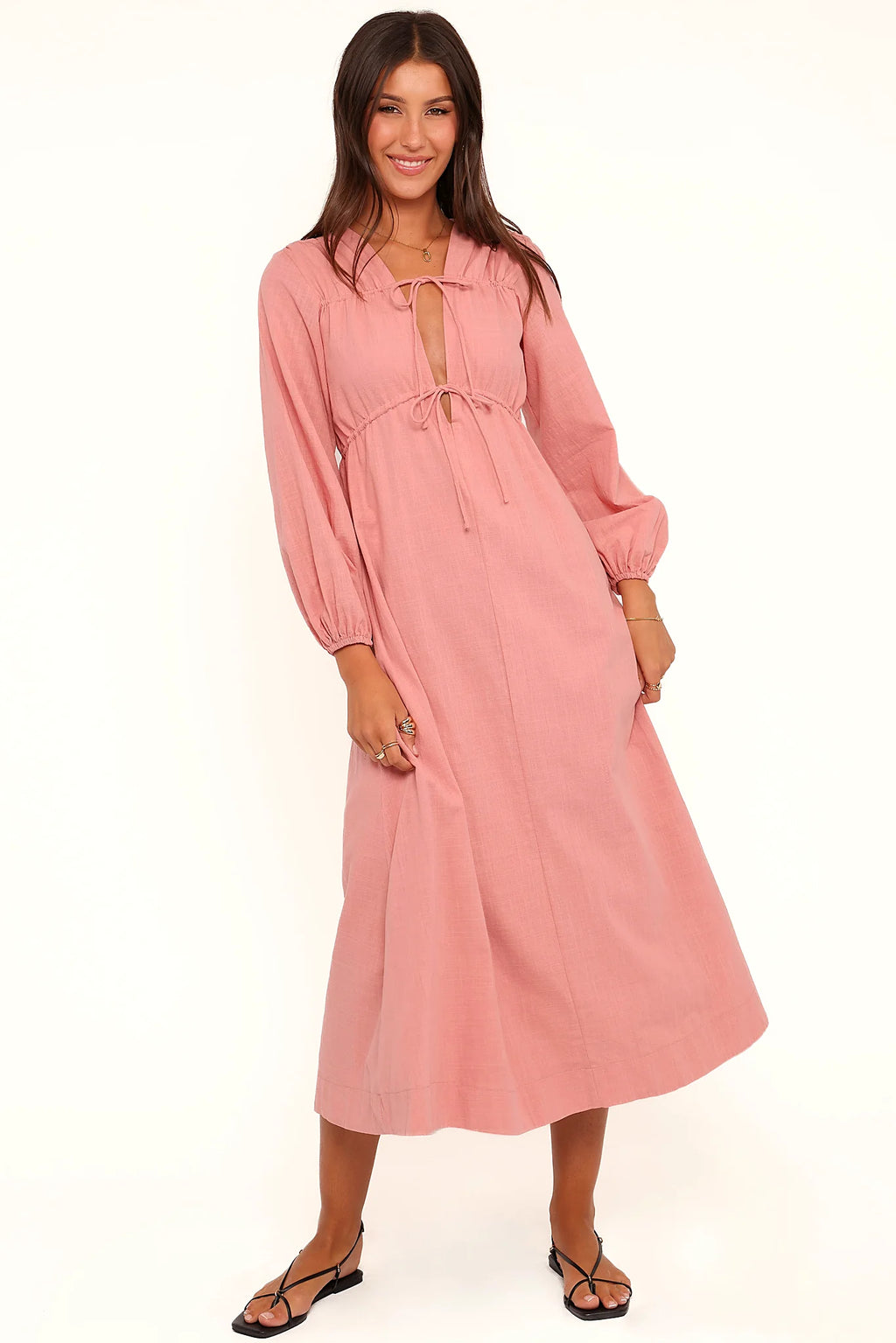 Long sleeves with elasticised cuffs on a pink cotton maxi dress