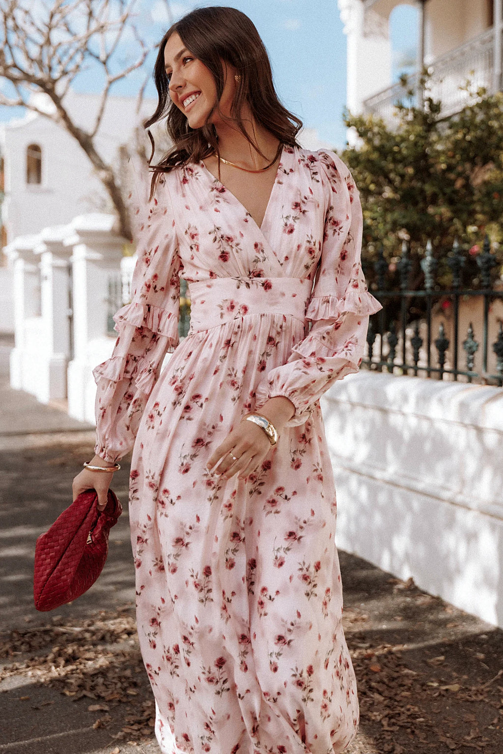 Tie close back v detail on a pink floral maxi dress