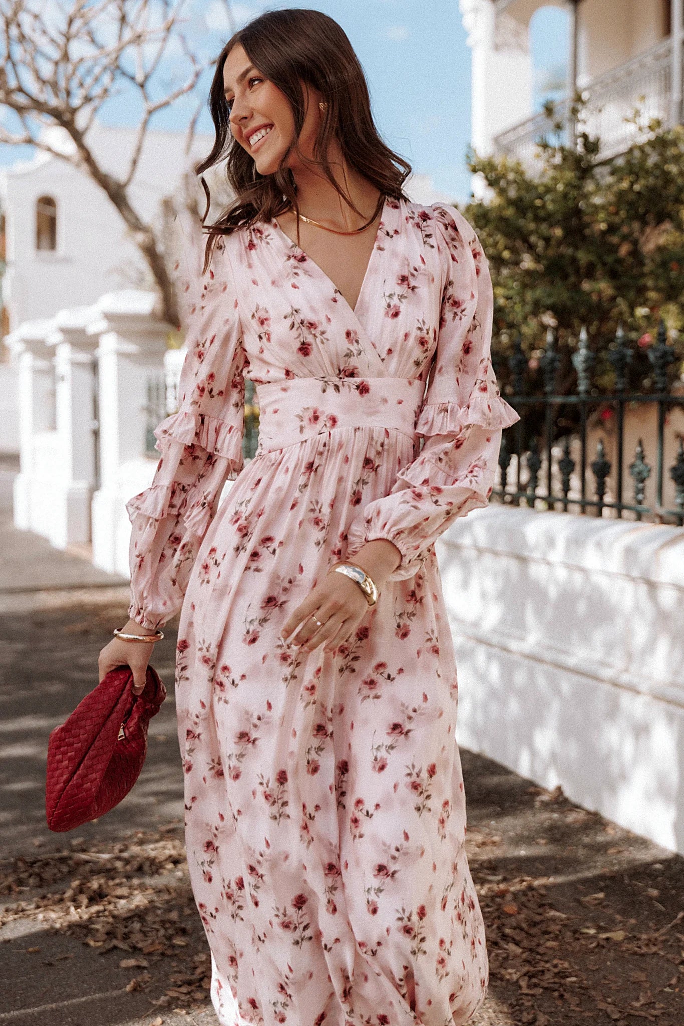 Tie close back v detail on a pink floral maxi dress